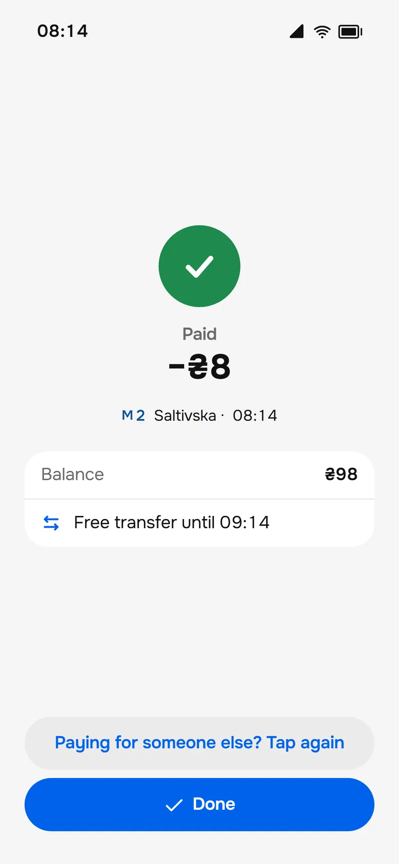 Tap result: Paid, fare, new balance and a free transfer window