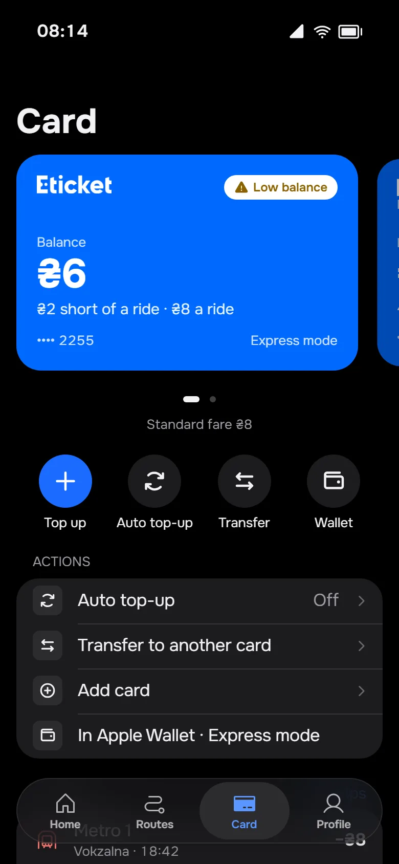 Card tab in the dark theme with a low balance and quick actions